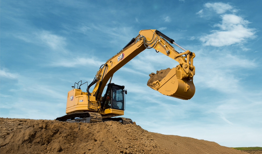 Greasing loader pins on Cat® equipment during daily maintenance check – DIY Caterpillar upkeep to reduce friction and extend machine life