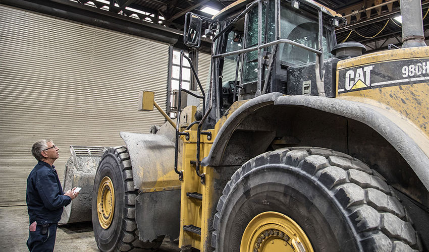 Cat® equipment filters and fluid containers arranged for maintenance reference